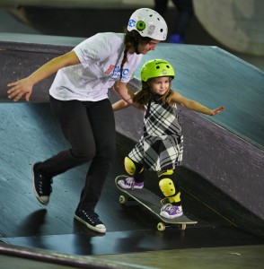 Pacific Northwest Magazine. Fitness story. Skateboard instructor Kristin Ebeling assists 4-year-old Frankie Gonzales during a skateboard class at the indoor All Together Skatepark in Wallingford.